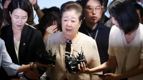 Disputed Religious Figure Rejects Gift-giving Accusations Involving Former South Korean President's Wife